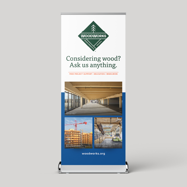 WoodWorks Tradeshow Banner Stating, "Considering wood? As us anything."