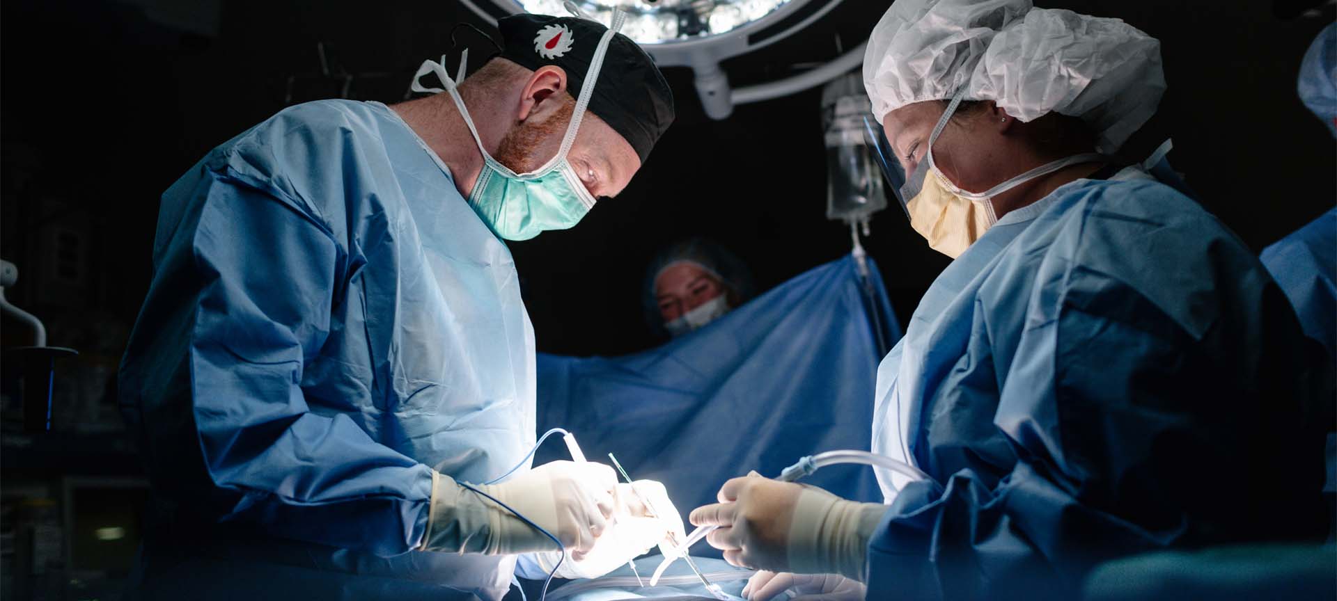 Surgeons around operating table