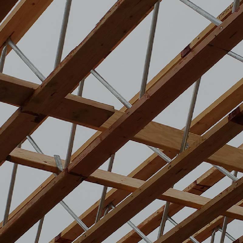 photo of laminated veneer lumber beams across a ceiling