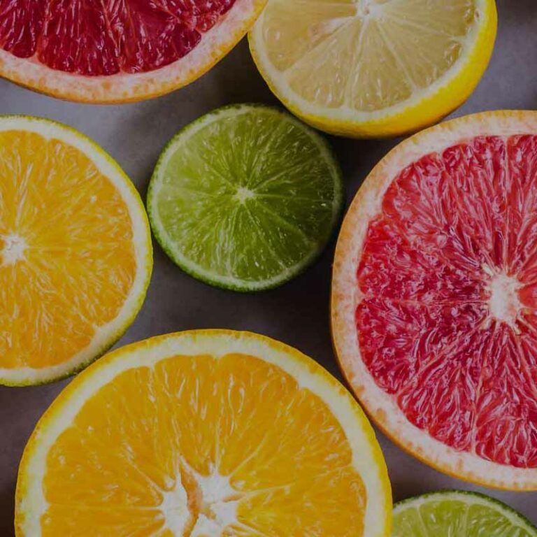 photo of assorted citric fruits: oranges, lime, grapefruit