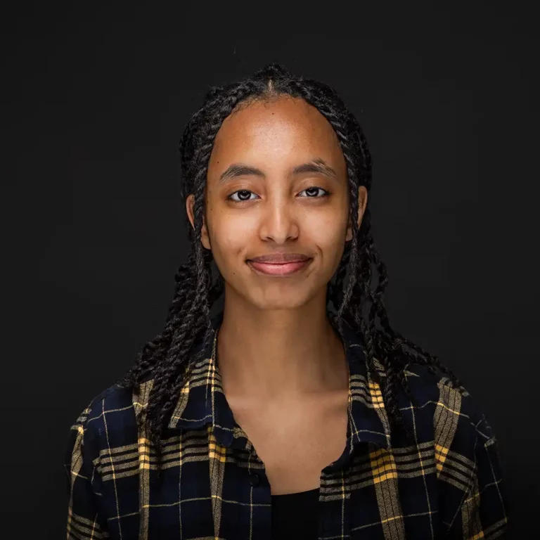 Headshot photo of Batu Olana