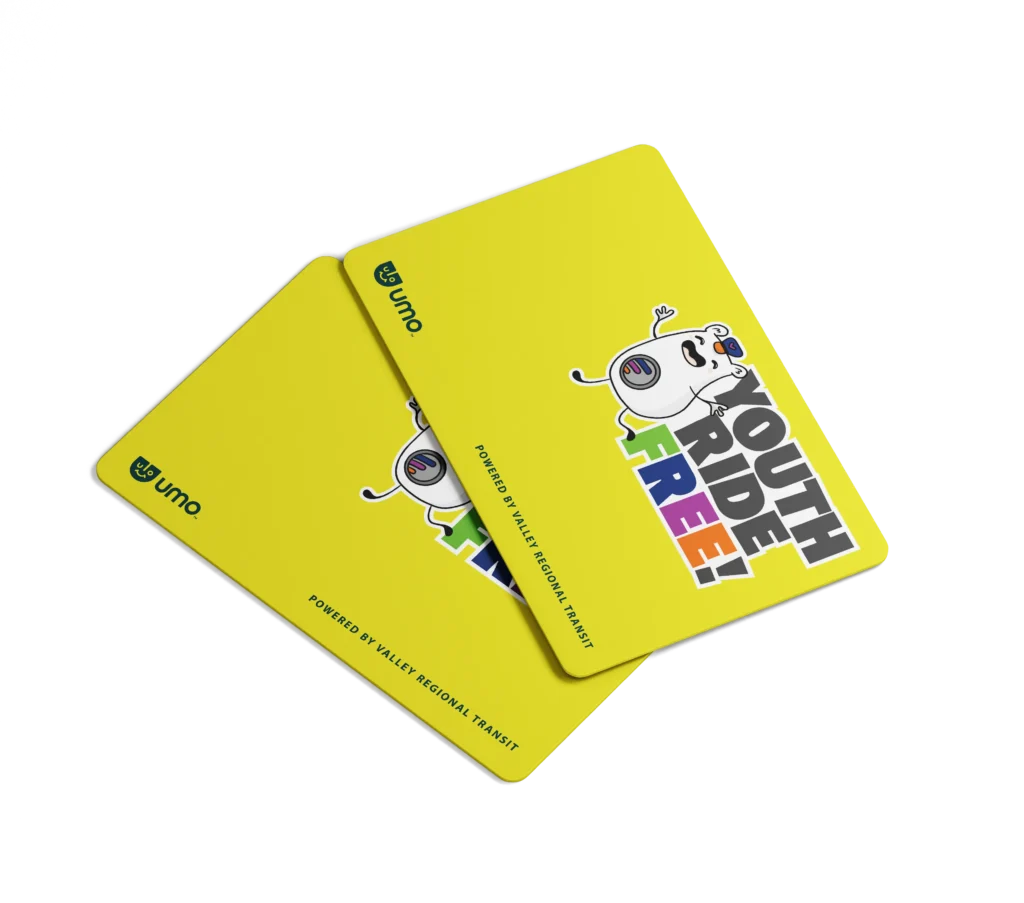 Two bus passes with Lil Rider stickers on them