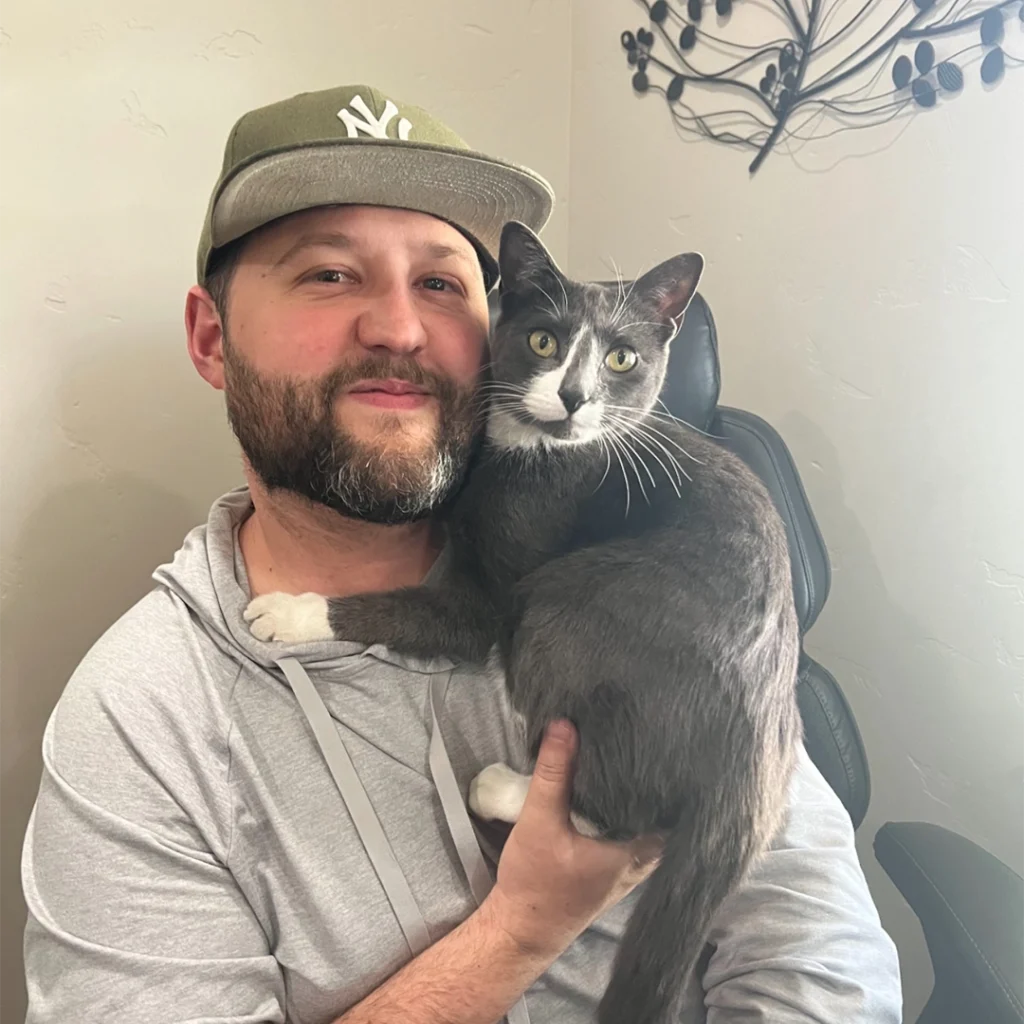 Photo of Chris Watts and his pet cat